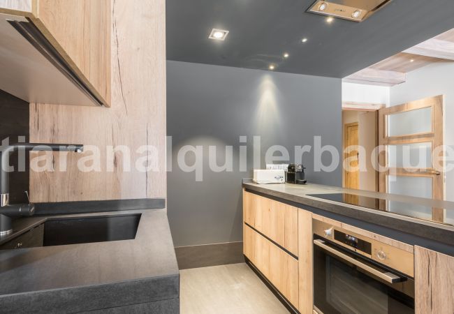 Kitchen of the apartment Peira Arroja by Totiaran, Nin de Beret, Baqueira, at the foot of the slopes