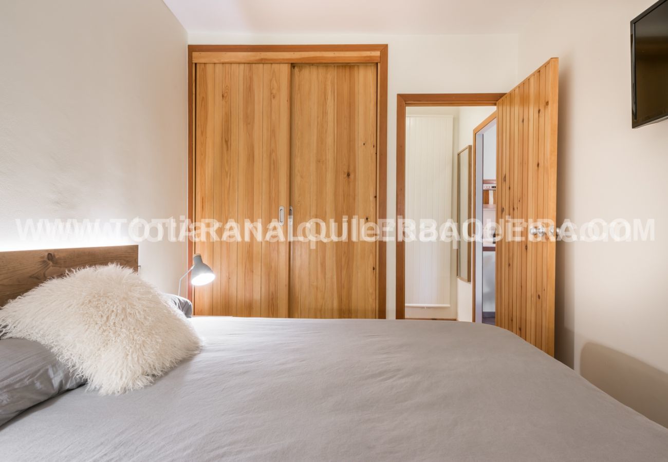 Nice bedroom of the Era Cabana by Totiaran apartment, downtown Baqueira, at the foot of the slopes