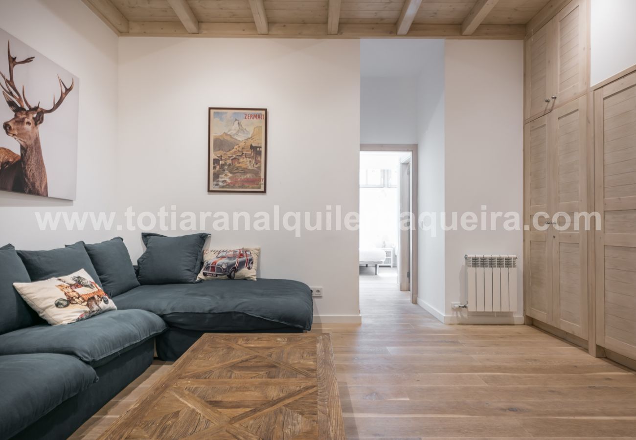 Living room of the house Eth Mur by Totiaran, Val de Ruda Urbanization, at the foot of the slopes