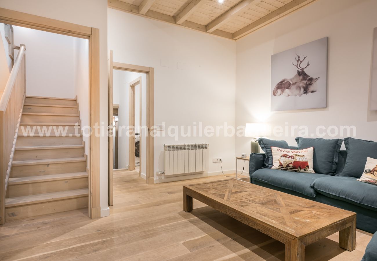 Living room of the Eth Mur by Totiaran house, Val de Ruda Urbanization, at the foot of the slopes