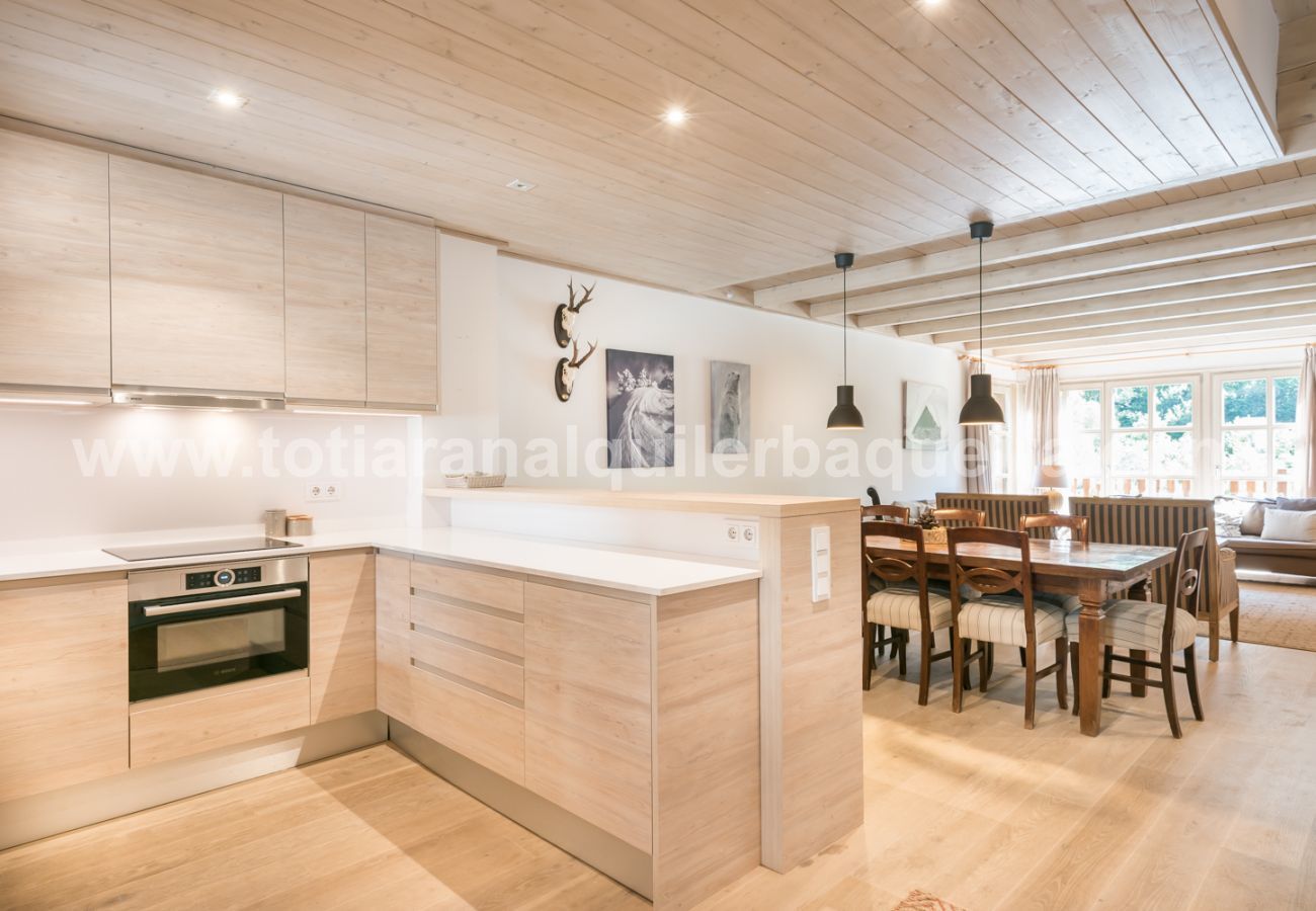 American Kitchen room of the Eth Mur by Totiaran house, Val de Ruda Urbanization, at the foot of the slopes