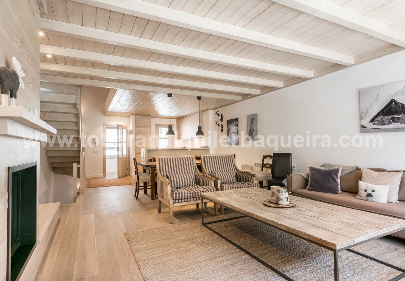 Living room of the Eth Mur by Totiaran house, Val de Ruda Urbanization, at the foot of the slopes