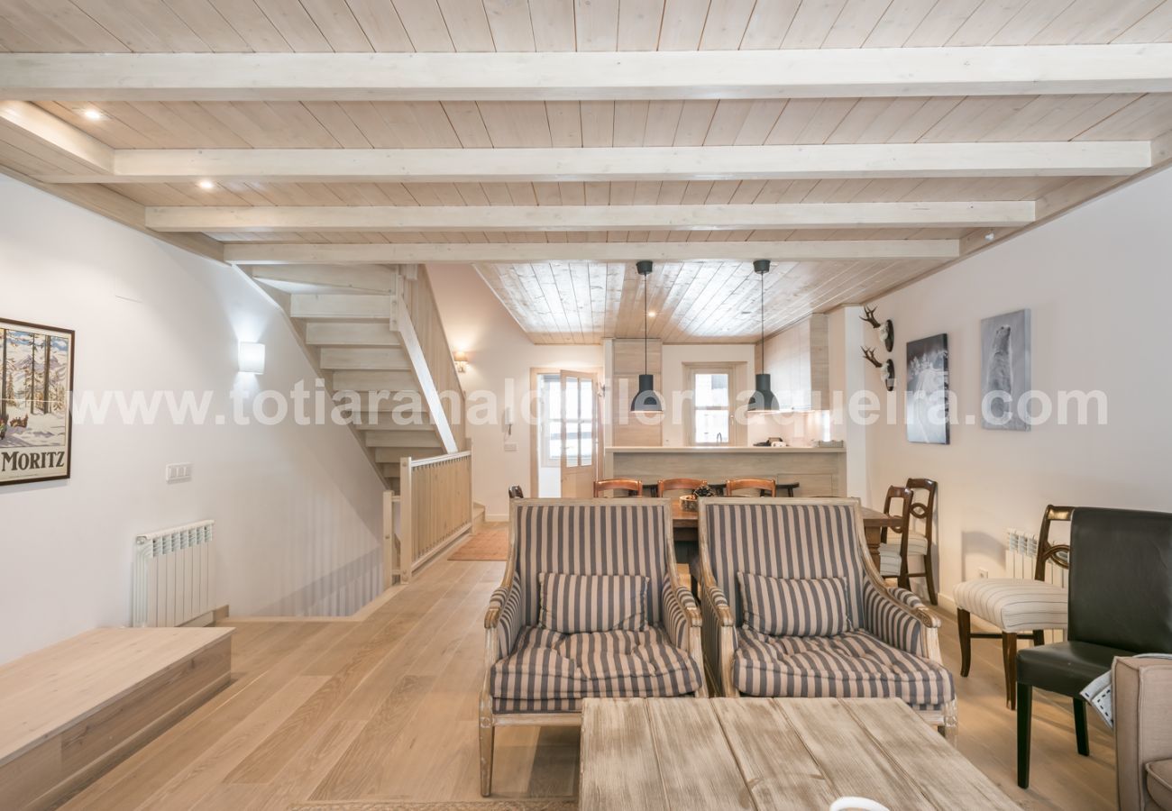 Living room of the house Eth Mur by Totiaran, Val de Ruda Urbanization, at the foot of the slopes