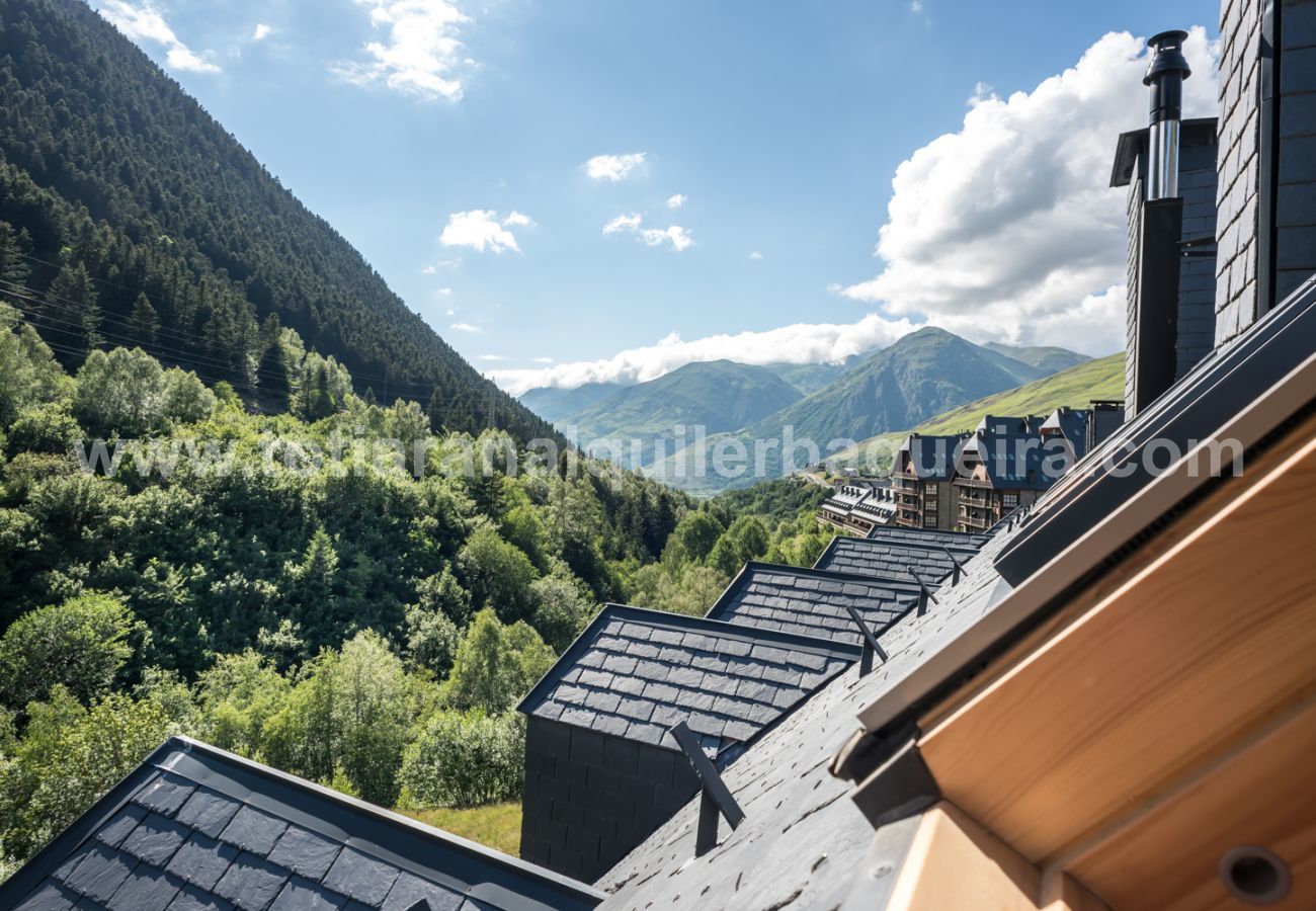Views of the house Eth Mur by Totiaran, Val de Ruda Urbanization, at the foot of the slopes